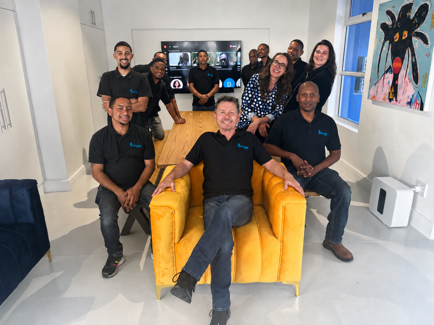 Paul Garde with the Trust Garde team in the office